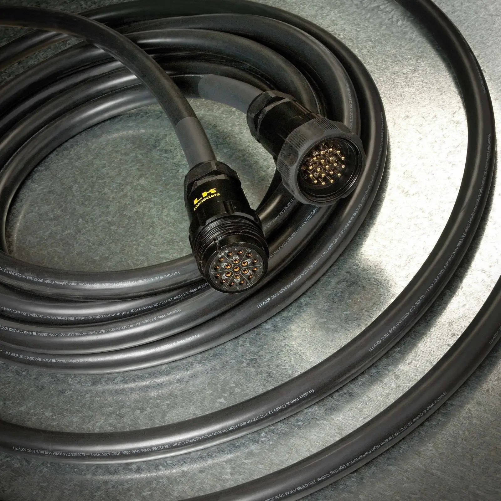 Coiled multi-pin circular cable connectors