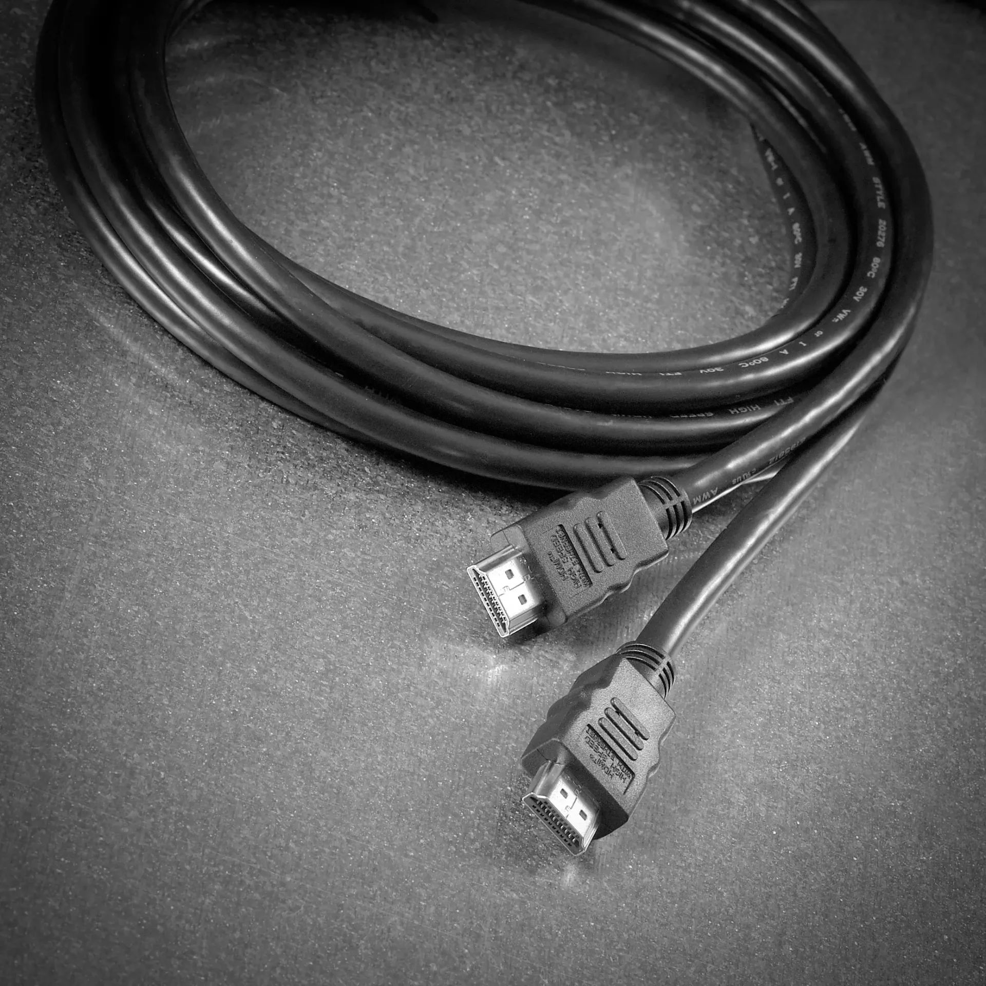 Coiled HDMI cable with dual connectors